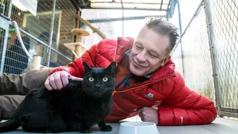 Chris Packham with black cat